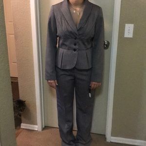 gray paint suit , never worn